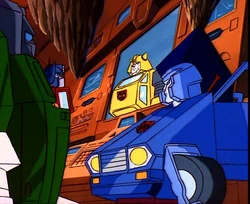 Hoist, Prime, and Skids ogle Bumblebee's animation model.