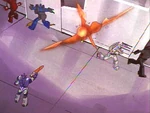 Galvatron settles an old score with the wall.