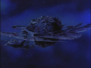 It used to look like a normal planet, but the Quintessons made it look weird to upset everyone who saw it. Seriously, they're that evil!