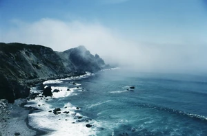 Fog drifts in from the Pacific Ocean on a typical day in June in Big Sur, California.