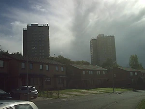 new housing on Ferguslie Park Crescent with the Millarston flats in the background