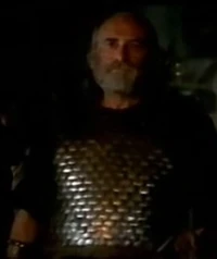 Janusz Rymkiewicz as Tavik in The Hexer