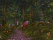 The interiors of Eco-Dome Midrealm, a forest-like jungle with the pink sky of Netherstorm protruding the vegetation.