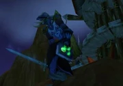 Tome of the Ice Lord held in offhand.