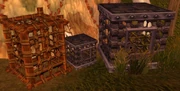 The cages behind Challe's Home.