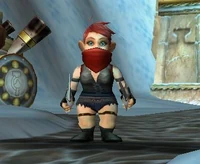 A female gnome rogue wearing the Red Defias Mask.