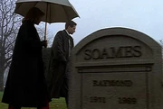 Mulder and Scully pass "Raymond Soames"' grave in the episode "Irresistible".