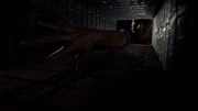 A shot of Tooms reaching down a chimney.