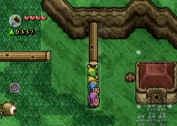 Link pulling on a log in The Field